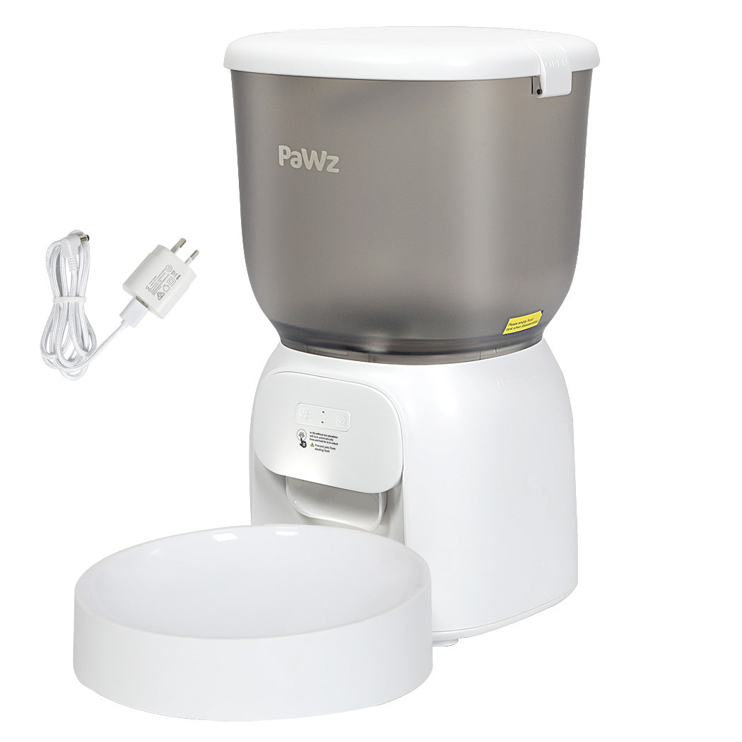 White and grey PaWz automatic pet feeder with a bowl, cable and power adapter