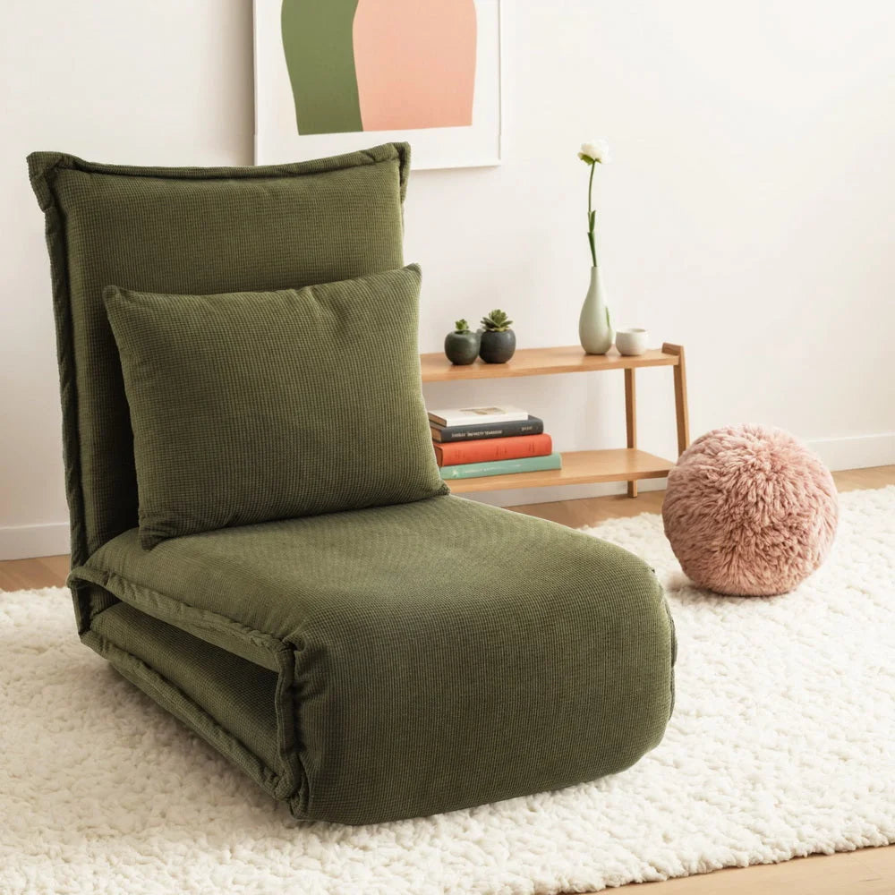 Green floor lounge sofa with size cues and product form