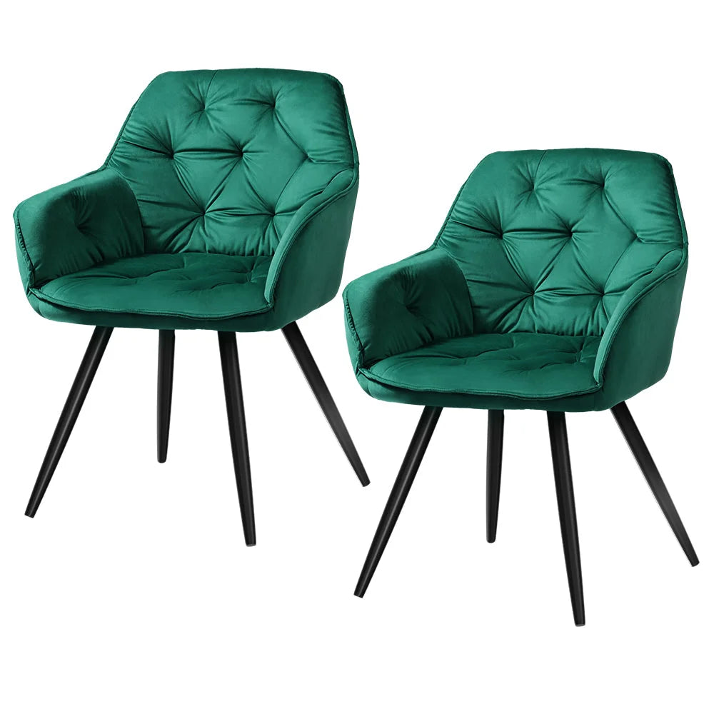 Set of two green velvet dining chairs