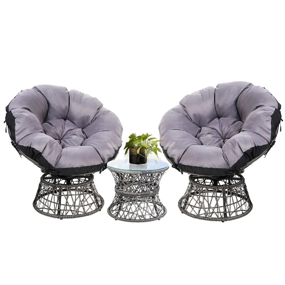 Grey papasan chair table with armrests and tapered chair legs