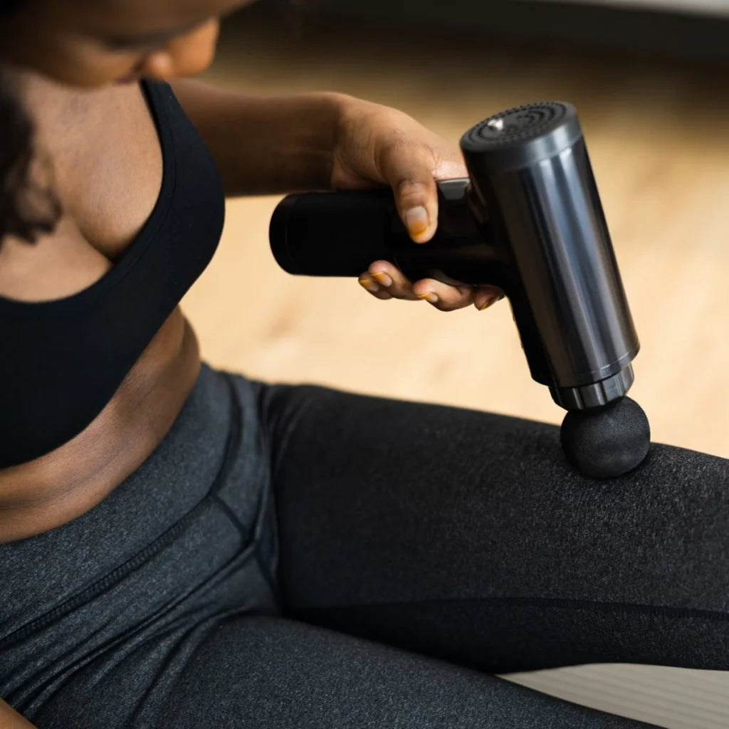 Remology Impact Therapy Percussive Massage Gun includes 4