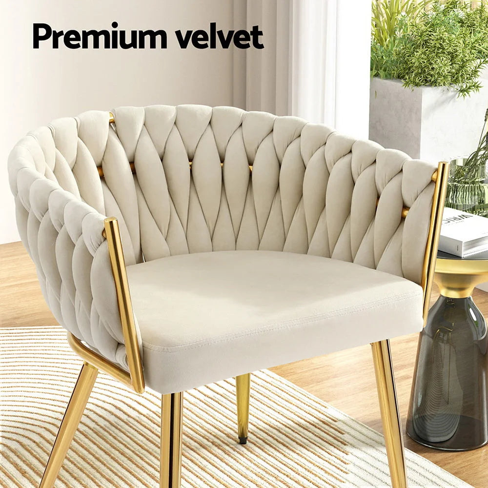 Beige velvet accent chair with padded seat and support frame