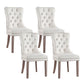 Set of four beige velvet dining chairs