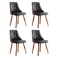 Set of four black dining chairs