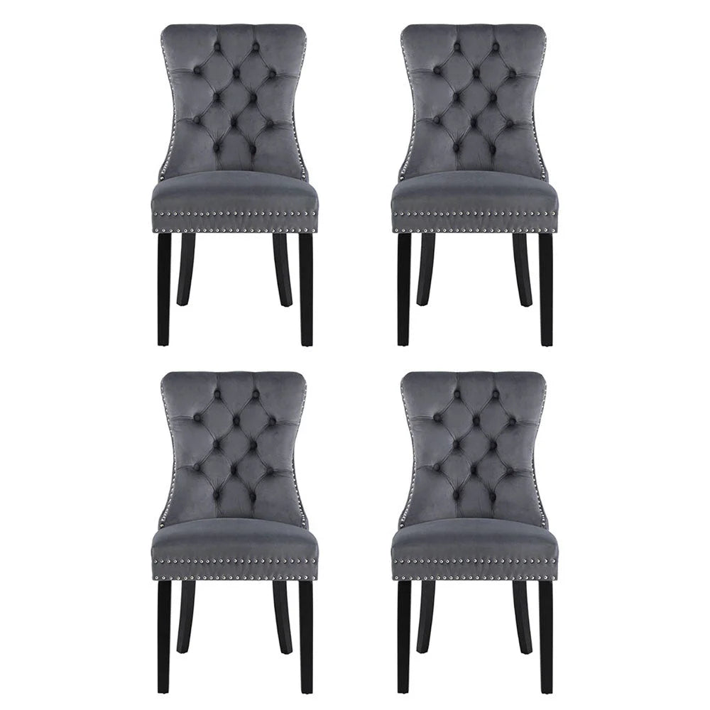 Set of four grey velvet dining chairs