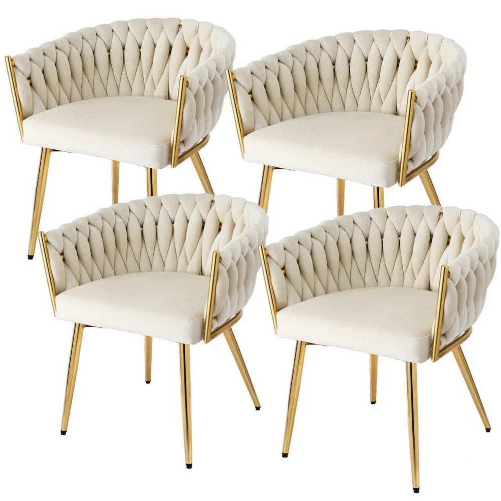 Set of four beige velvet dining chairs
