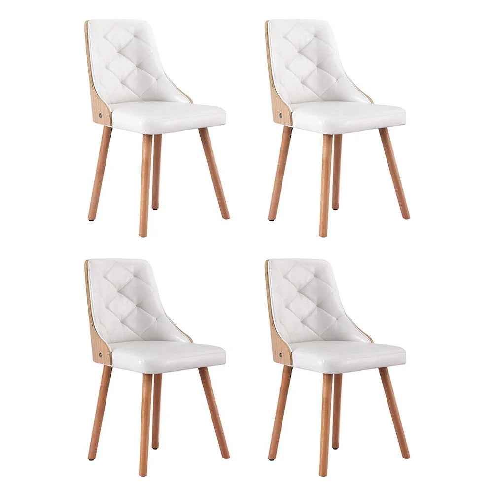 Set of four white dining chairs
