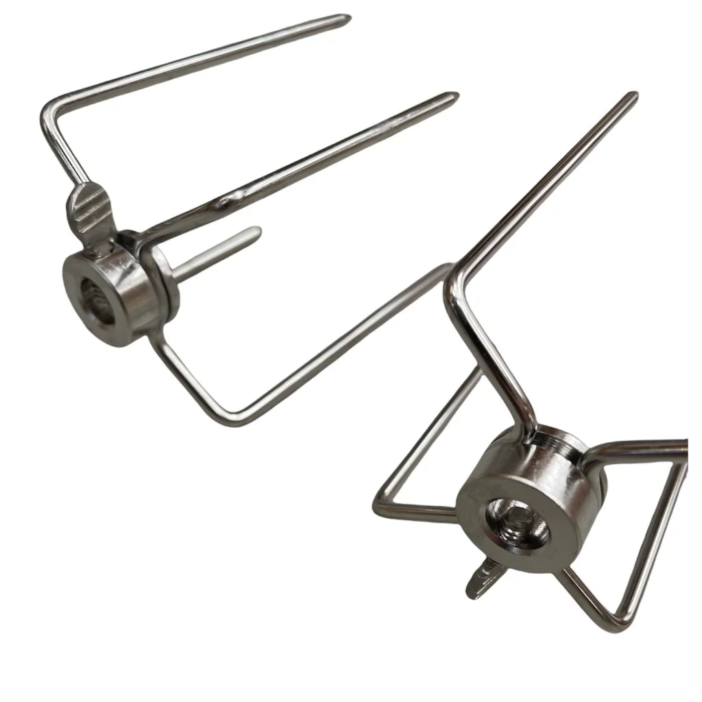 Rotisserie spit forks with surface detail shown