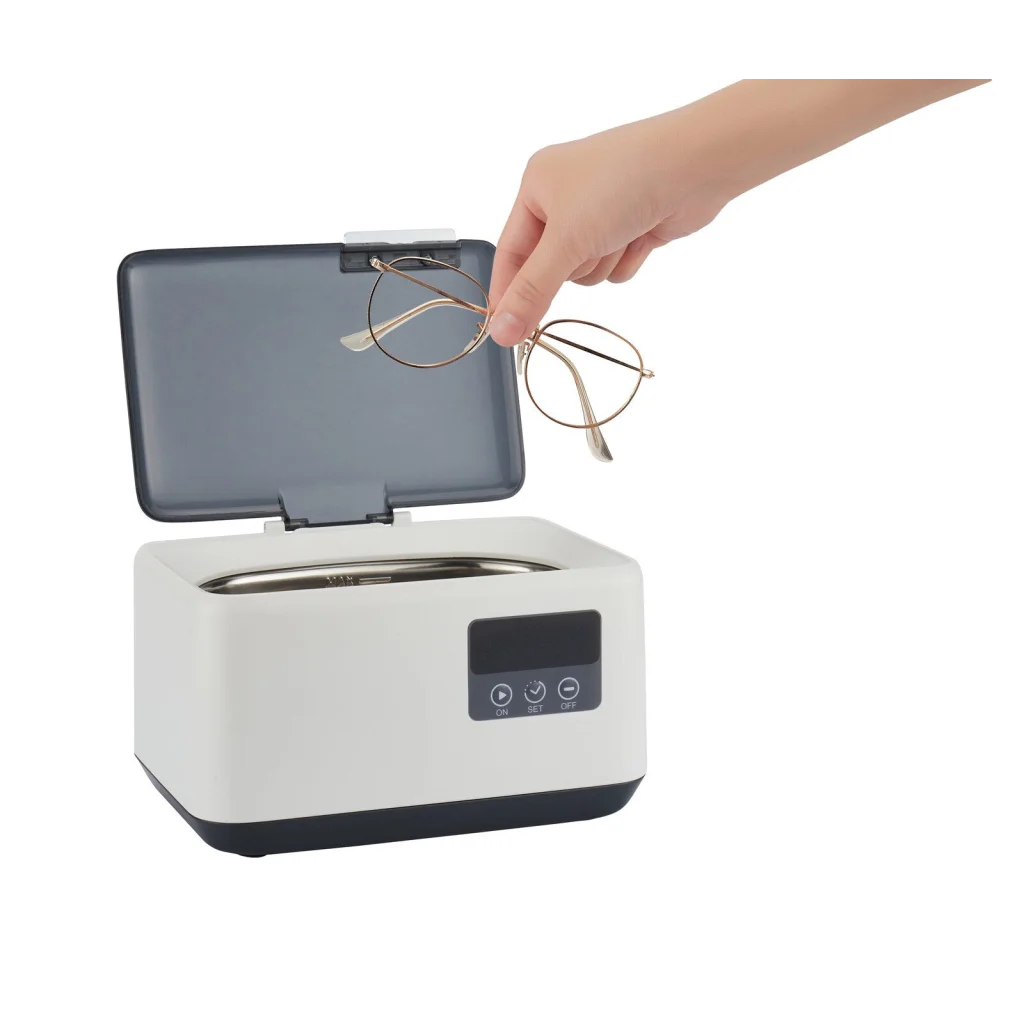 Ultrasonic jewellery cleaner with component details and storage context