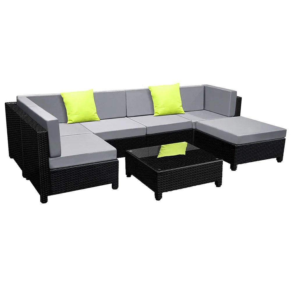 Black wicker outdoor sofa couches with corner seats and table arrangement