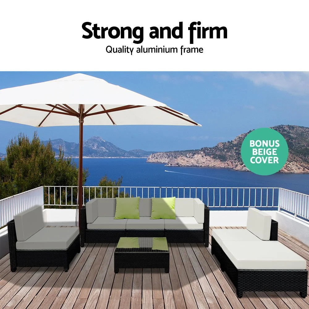 Black wicker outdoor sofa couches with woven seating and matching table