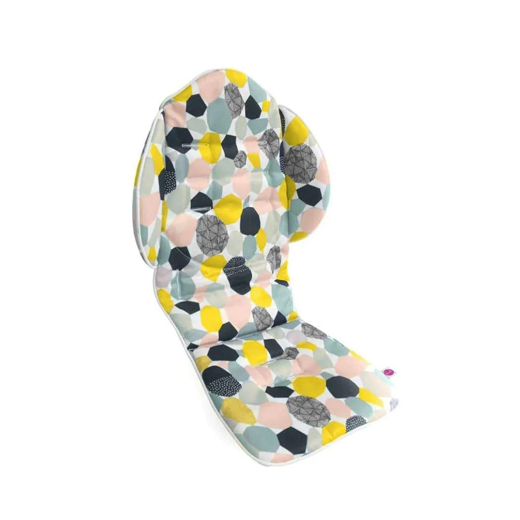 Oribel Cocoon seat liner with a multicoloured geometric pattern