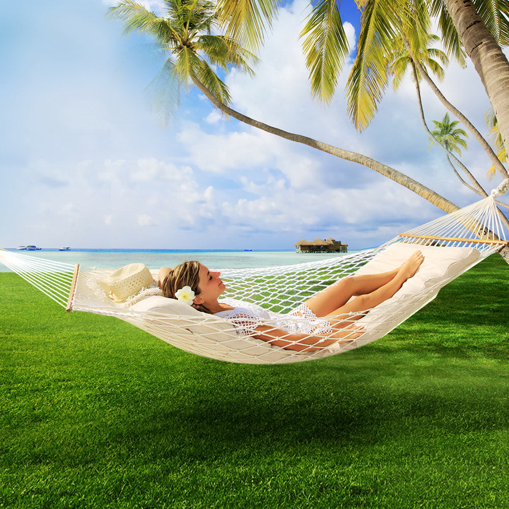 Cream swing hammock bed with frame detail shown