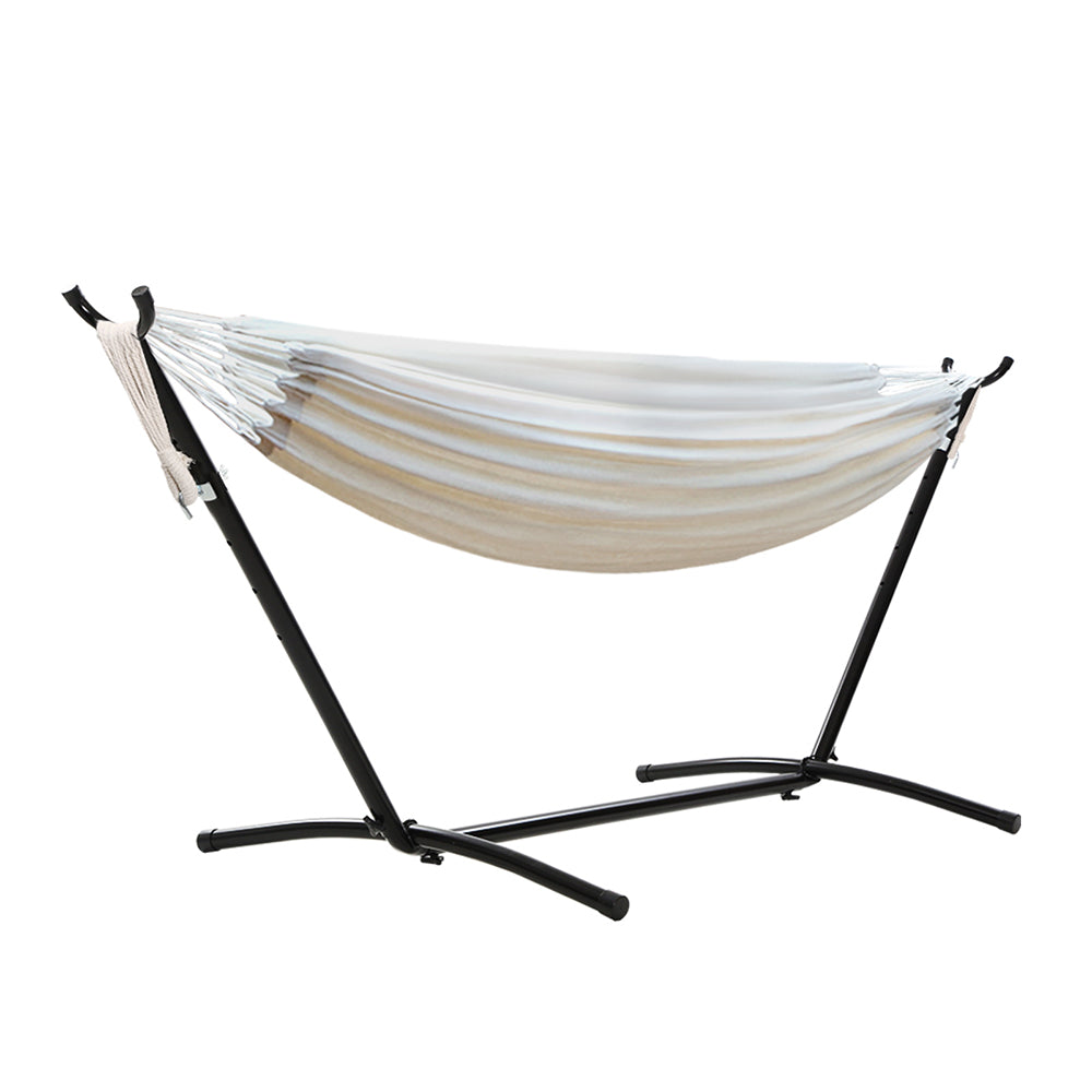 Cotton outdoor hammock with pack contents and accessory layout