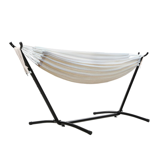 Cotton outdoor hammock with pack contents and accessory layout
