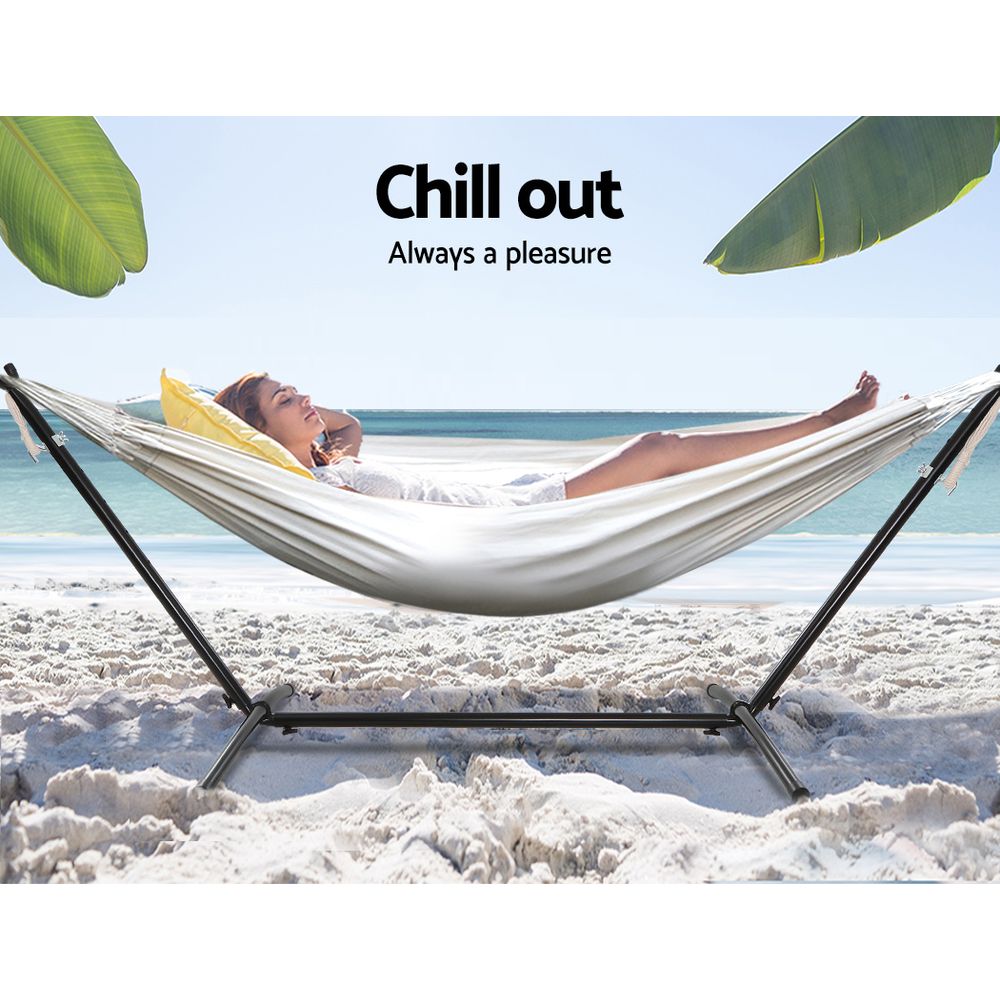 Outdoor hammock with pack contents and accessory layout