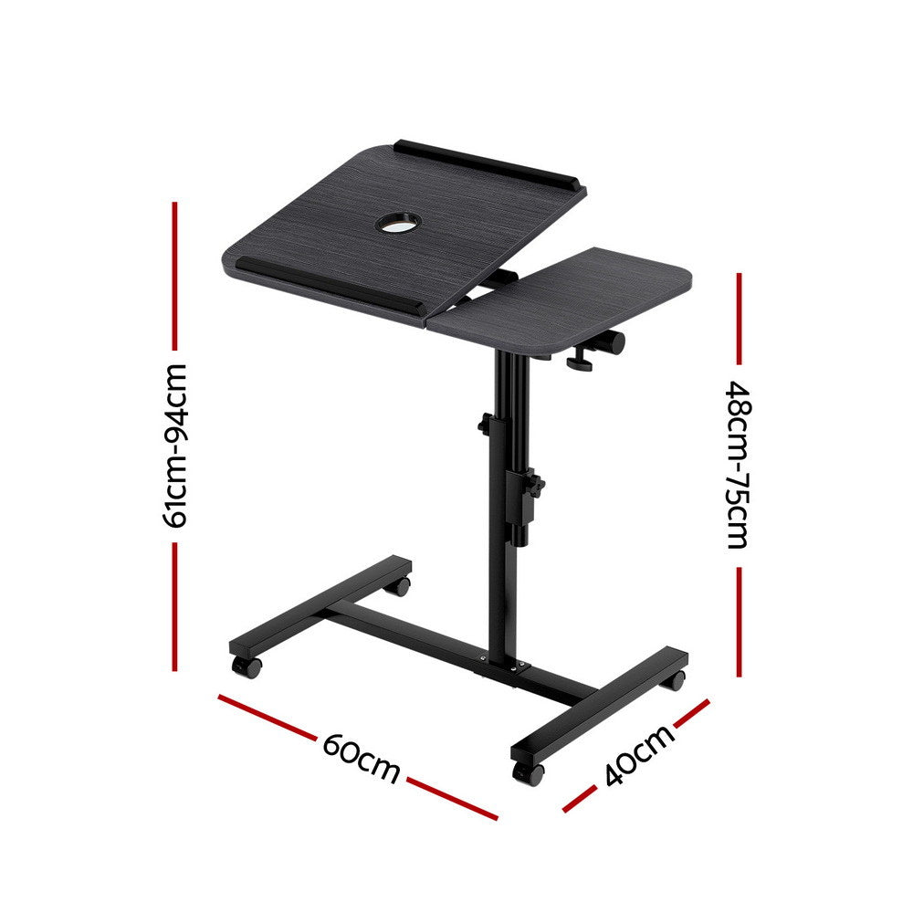 Black computer desk with adjustable worktop and sturdy legs