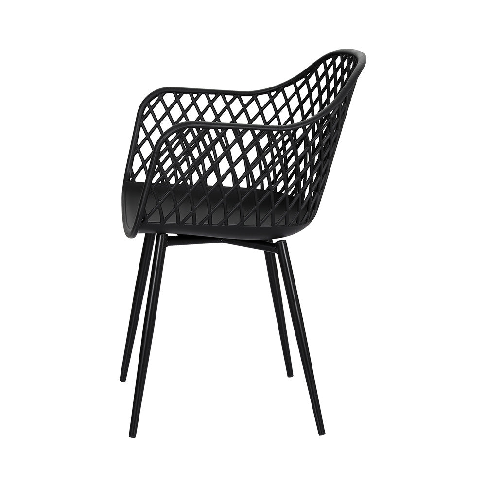 Set of four black dining chairs