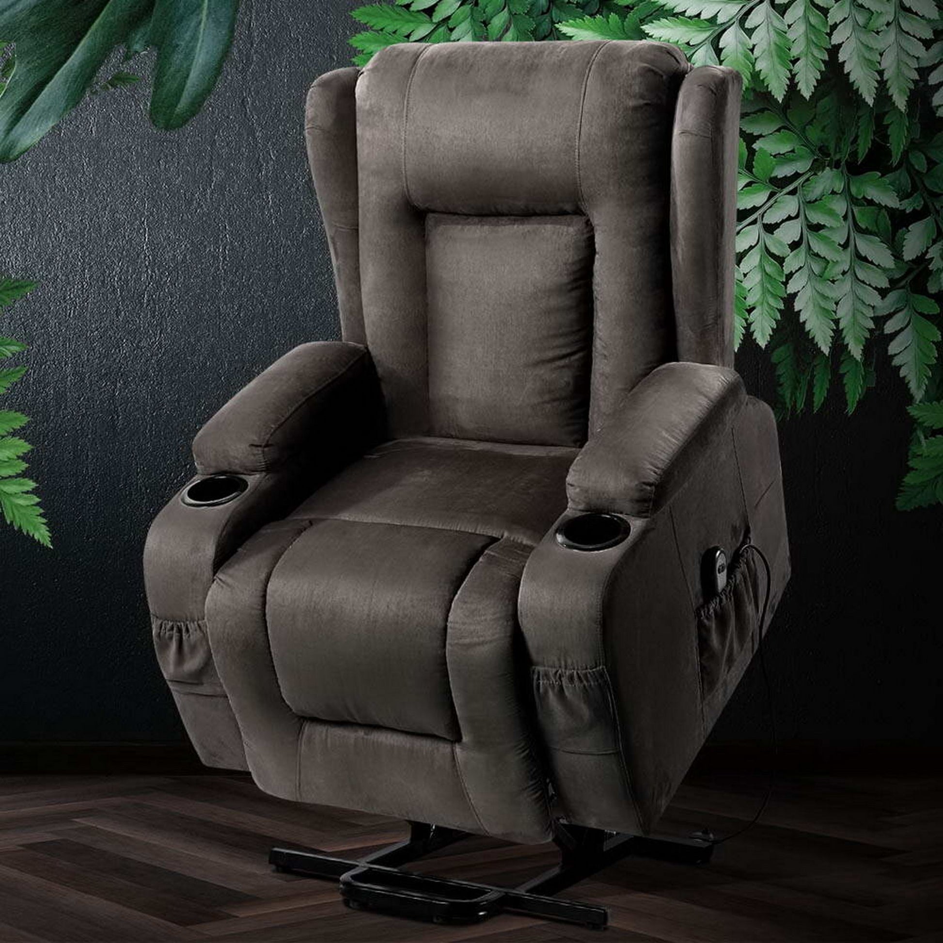 Grey fabric lift recliner chair beside indoor plants