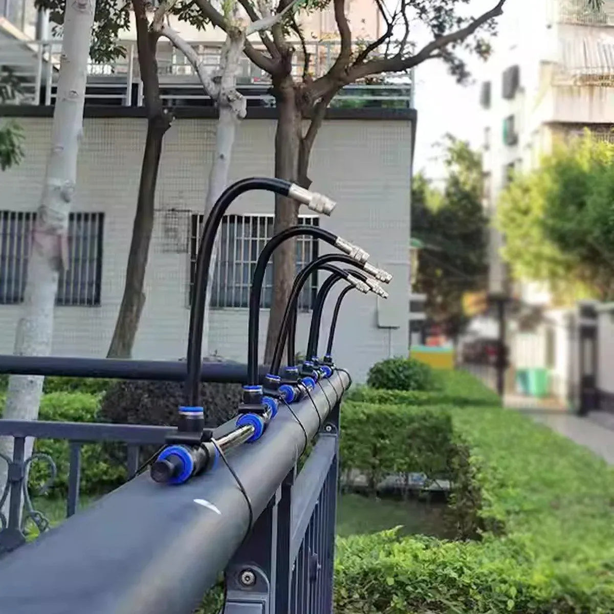 Watering system adjustable with tabletop and support frame