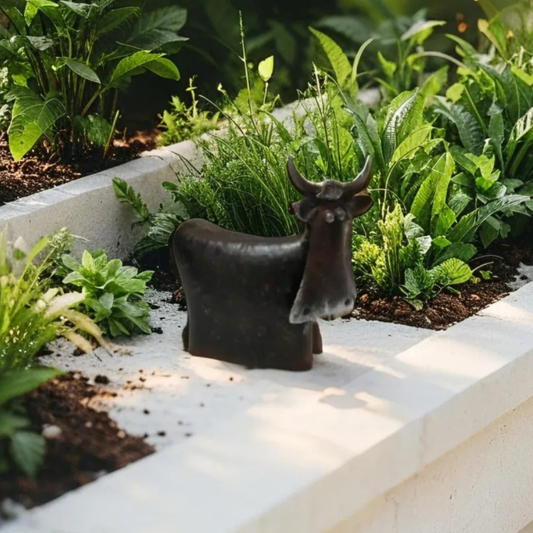 Natures Art Sitting Cow 25cm