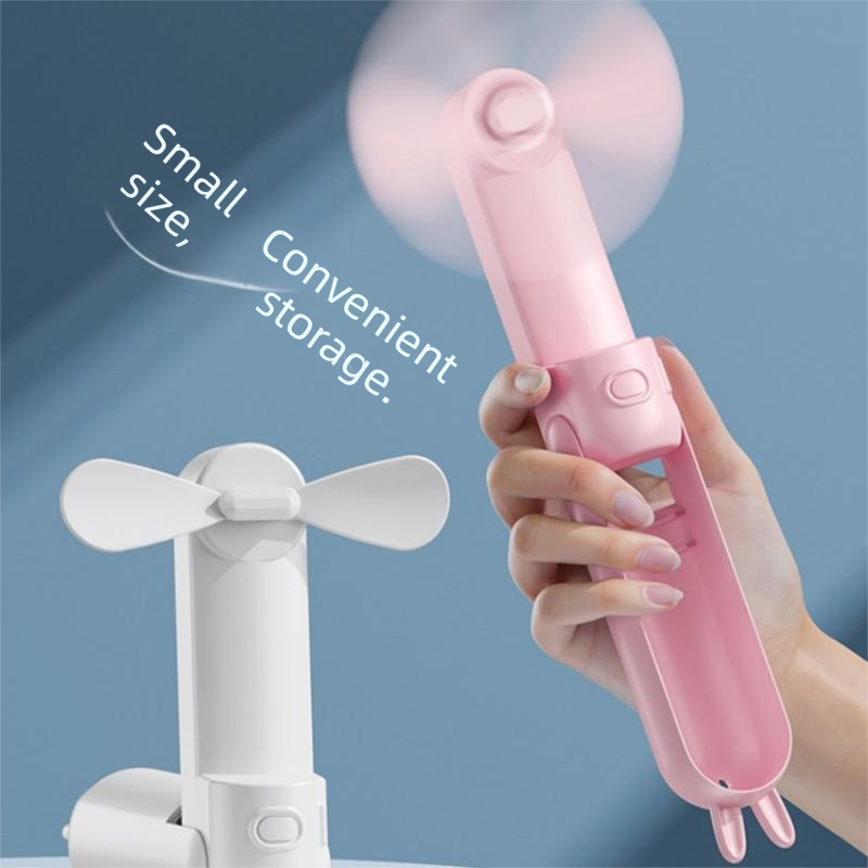 Pink Foldable Mini Handheld Fan—a portable, USB-rechargeable desktop fan featuring a cute rabbit design. It offers three speed settings, soft blades, and 270-degree rotation, with a built-in 1200mAh battery—ideal for travel, office use, and staying cool o
