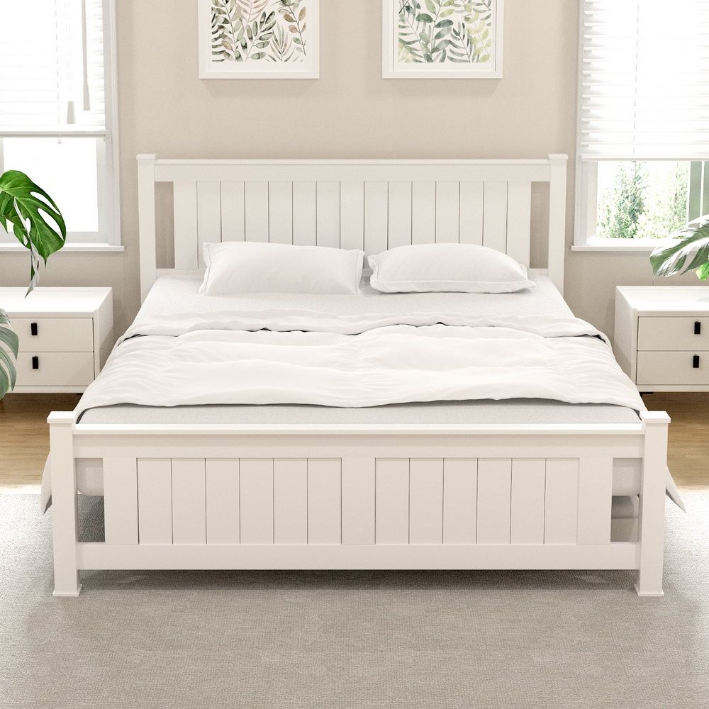 White wooden bed queen size with component details and storage context