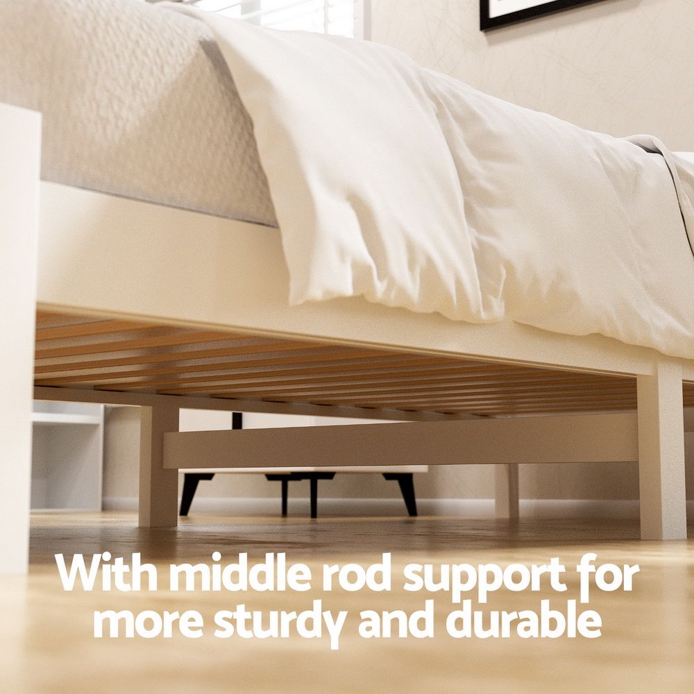 White wooden bed king single with clean finish and fitted components