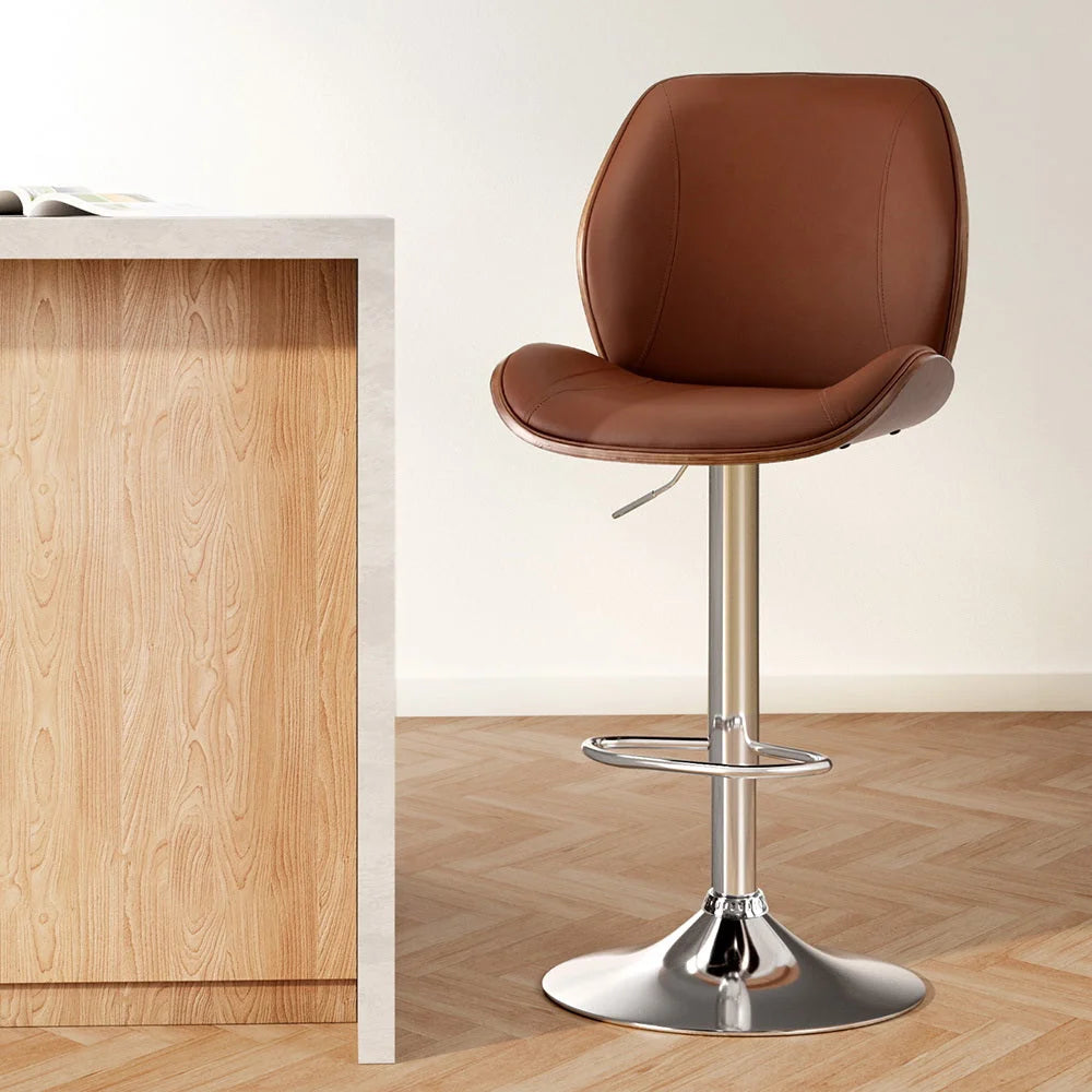 Brown leather bar stool bentwood with cushioned seat and curved backrest