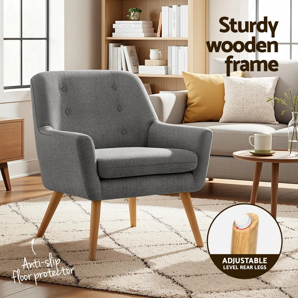 Grey accent chair with padded seat and support frame