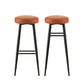 Brown leather dining chair set with shaped seat and supportive backrest