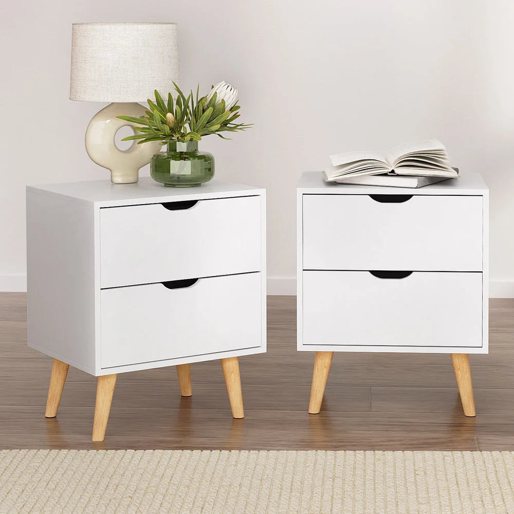 White bedside table with two drawers and timber legs