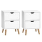 White bedside table with small bedroom cabinet and handle details