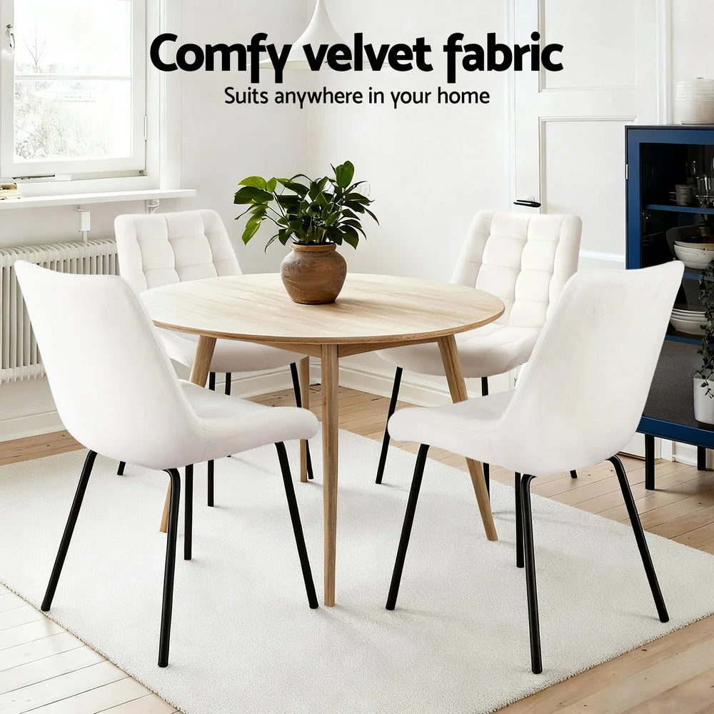 Set of two beige velvet dining chairs