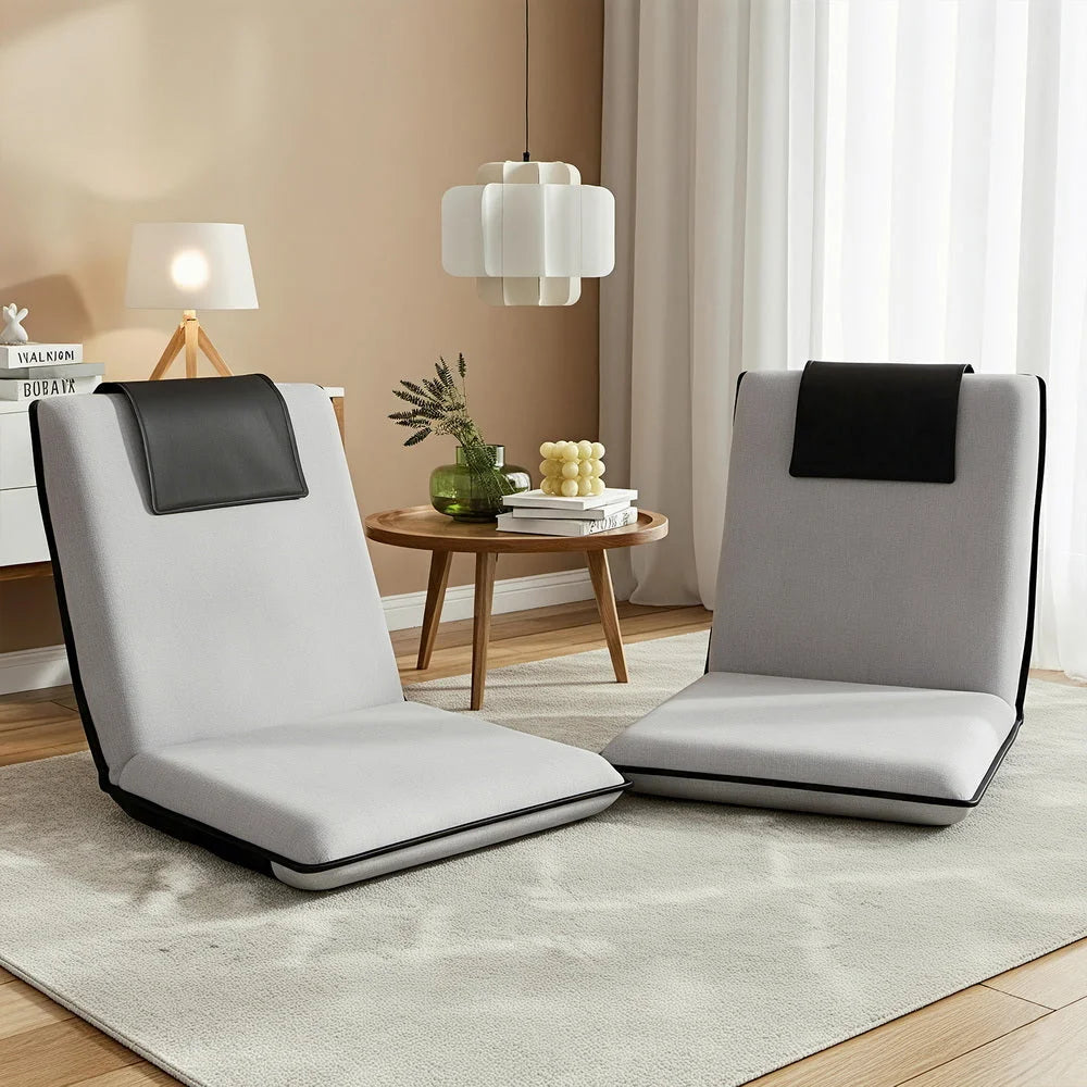 Grey velvet floor lounge sofa with velvet cushion panels and foldable sofa base