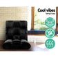 Black fabric lounge sofa bed with pack contents and accessory layout