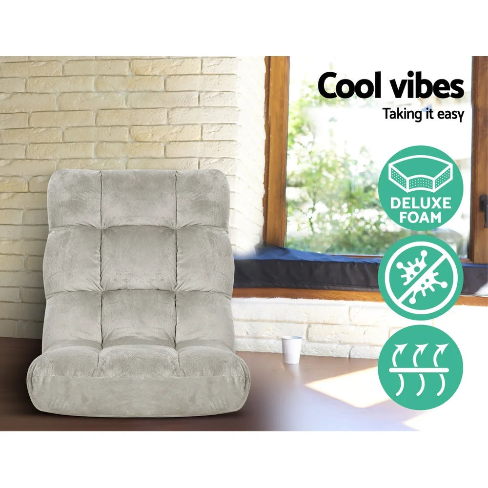 Grey fabric lounge sofa bed with pack contents and accessory layout