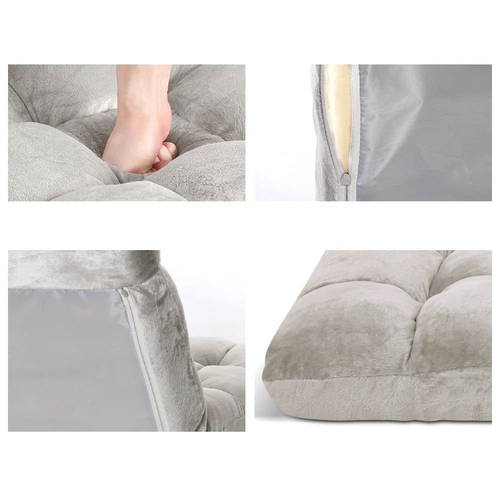 Grey fabric lounge sofa bed with compact layout and accessory details