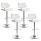 Set of four white leather dining chairs