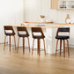 Set of four leather swivel bar stools