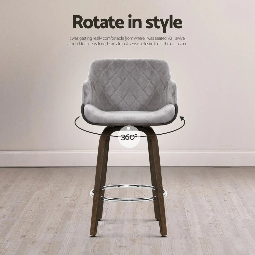 Set of four velvet swivel bar stools