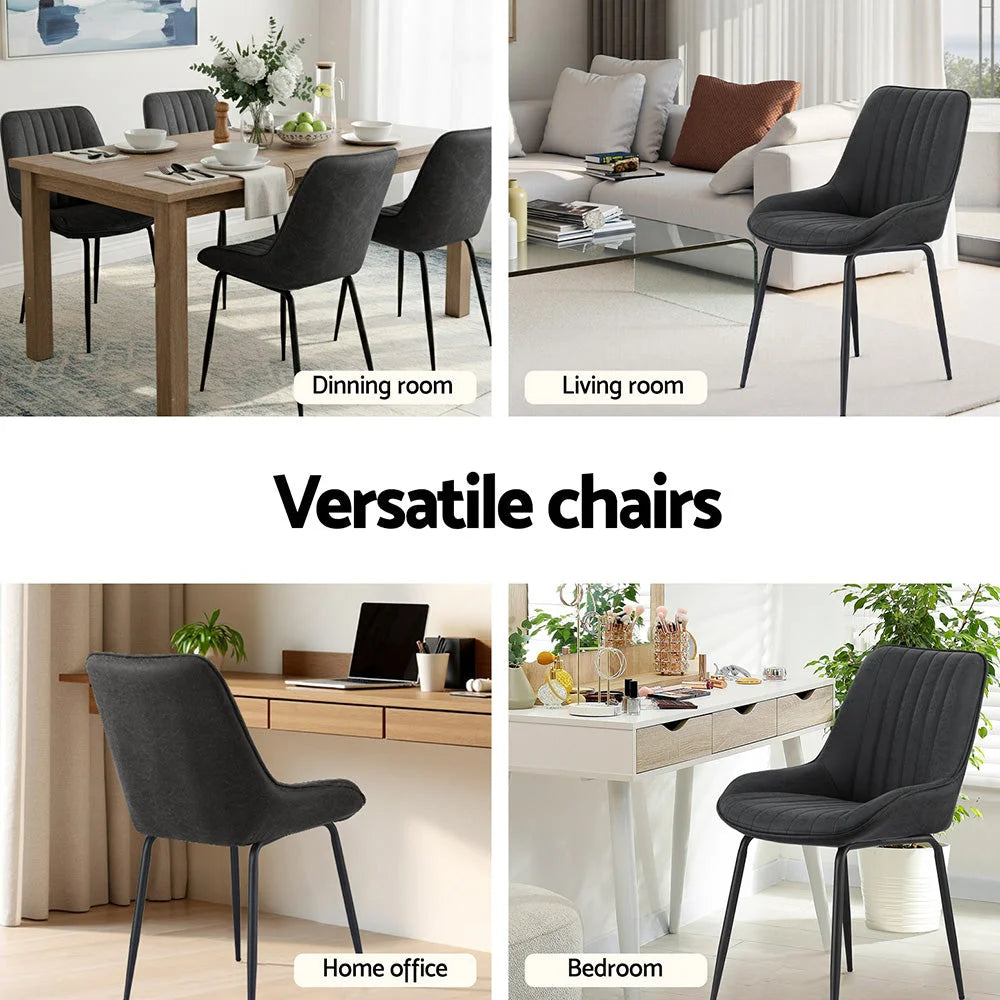 Set of four black PU leather dining chairs
