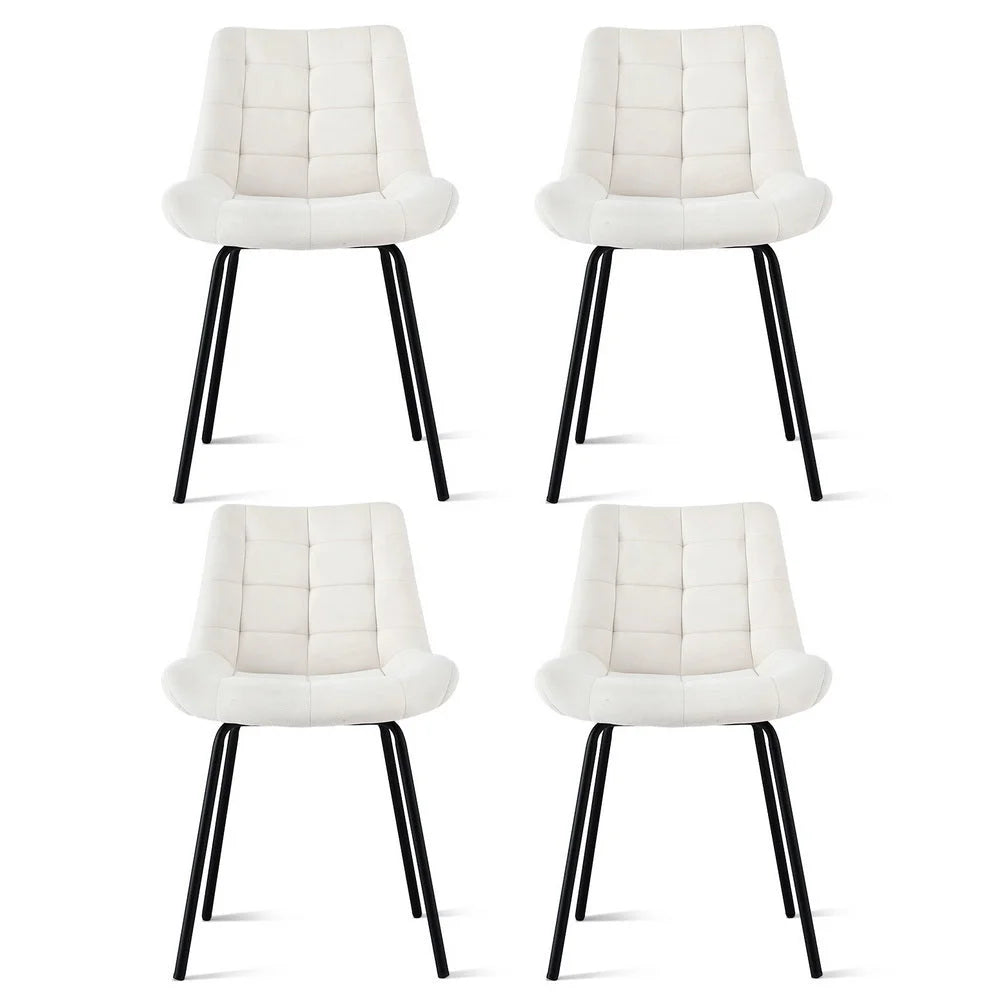 Beige velvet dining chair set with cushioned seat and curved backrest