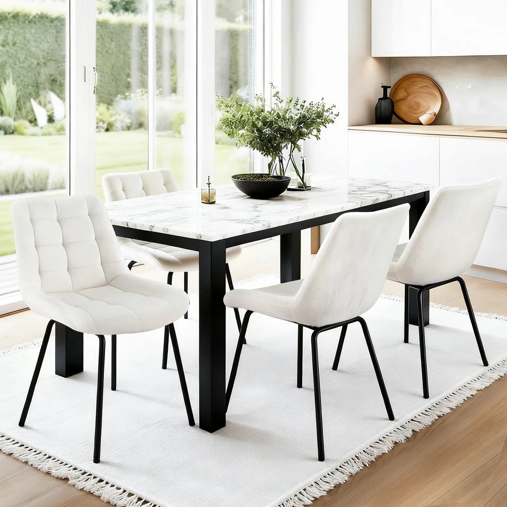 Beige velvet dining chair set with seat padding and sturdy legs