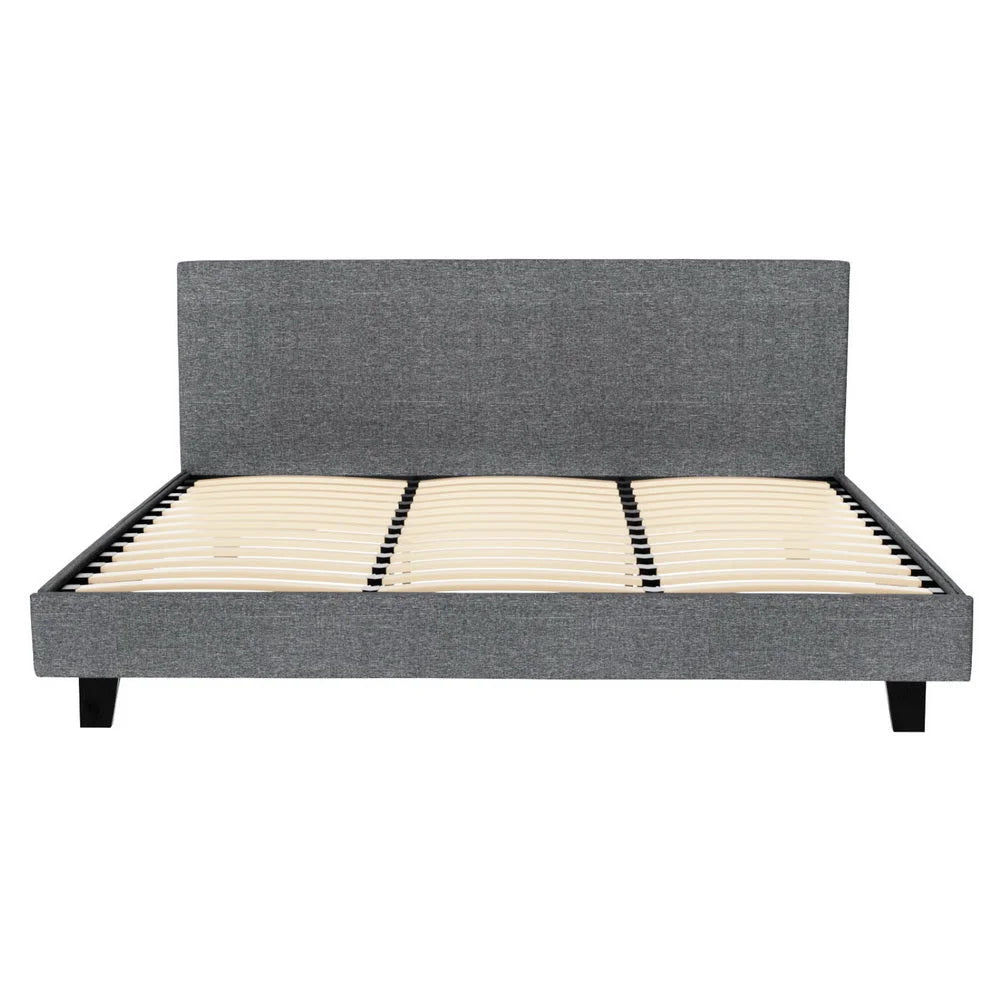 Grey bed frame with upholstered frame and mattress support