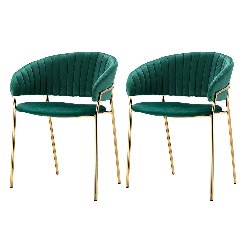 Green velvet dining chair set with seat padding and sturdy legs