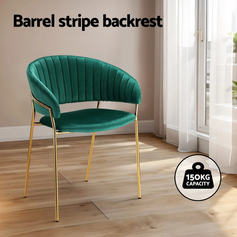 Green velvet dining chair set with chair legs and seat detailing