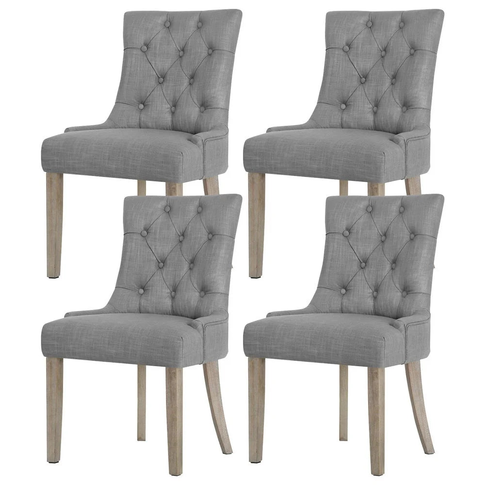 Set of four grey dining chairs