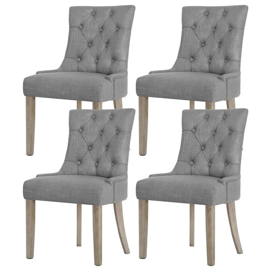 Set of four grey dining chairs