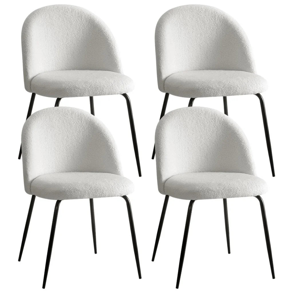 Set of four white dining chairs